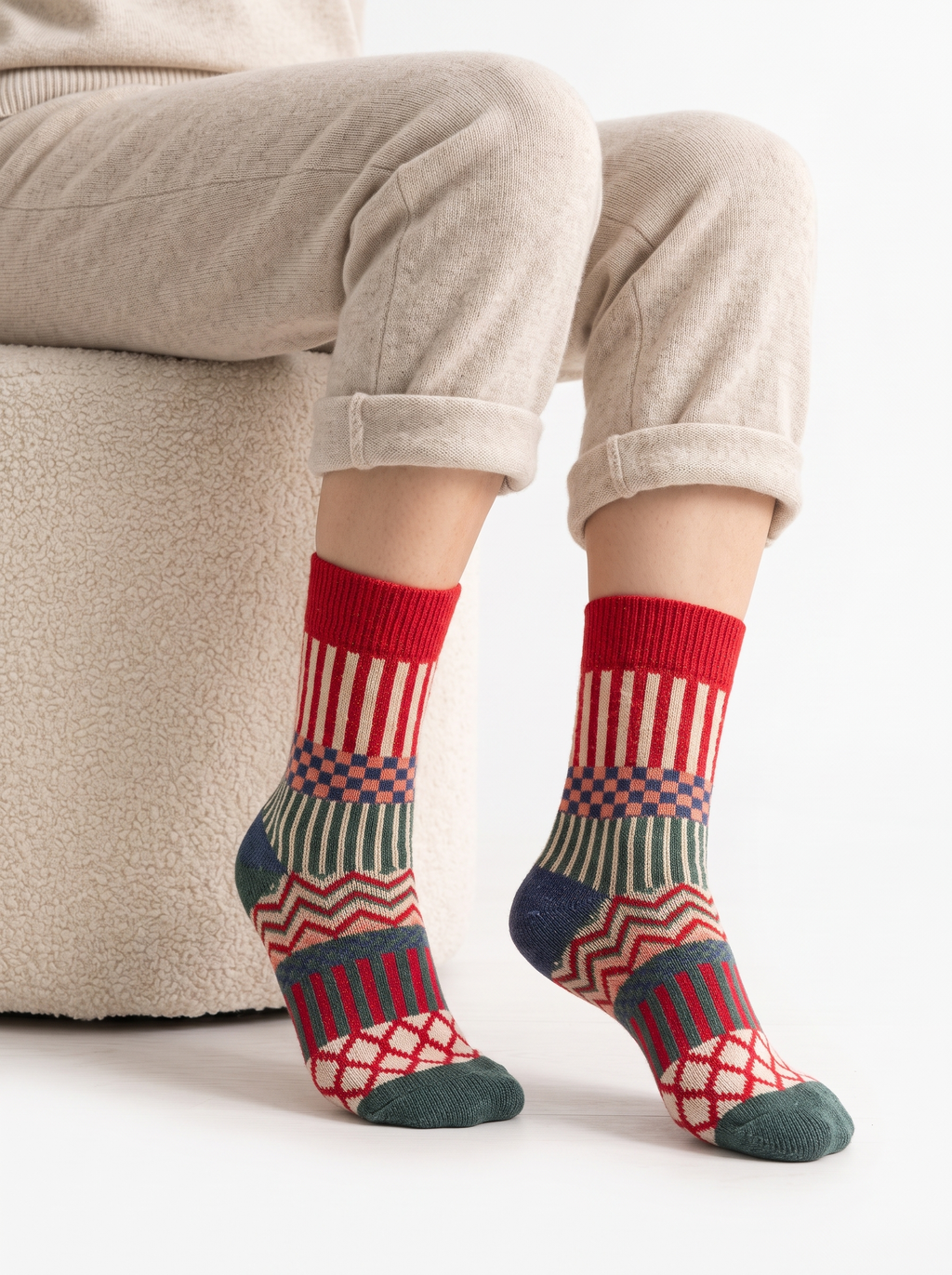 Red Scandinavian pattern wool socks worn with lounge trousers
